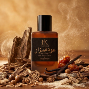 HK Fragrance Oud e Zarrar bottle surrounded by oud wood, vanilla pods, and dates - Impression of Ameer Al Oud
